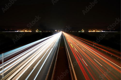 light trails on highway symmetrical