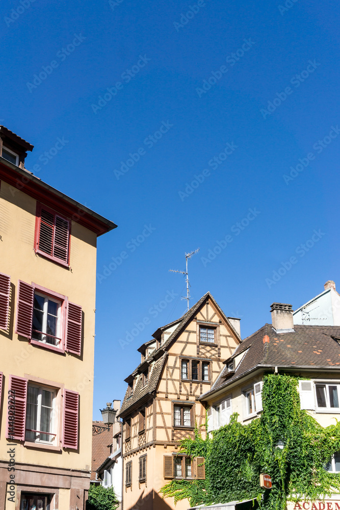 Fototapeta premium STRASBOURG, FRANCE - August 23, 2016 : Street view of Traditional houses in Strasbourg, Alsace. is the official seat of the European Parliament, Located close to the border with Germany