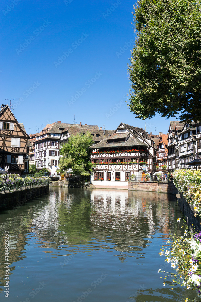 STRASBOURG, FRANCE - August 23, 2016 : Street view of Traditional houses in Strasbourg,  Alsace. is the official seat of the European Parliament, Located close to the border with Germany