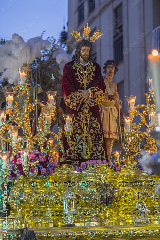 Fototapeta premium Brotherhood of Jesus corsage making station of penitence in front at the town hall, Linares, Jaen province, Andalusia, Spain