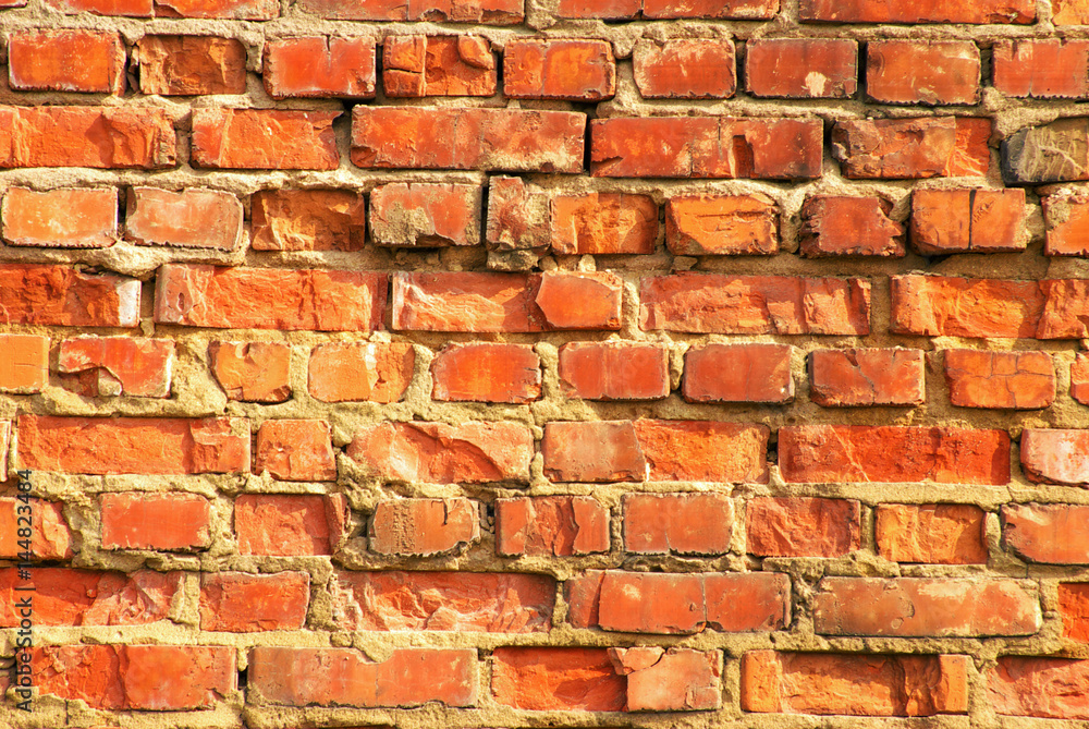 Obraz premium Grunge orange brick wall background texture
