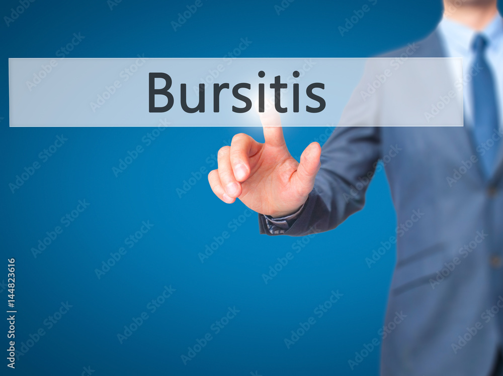 Bursitis - Businessman hand pressing button on touch screen interface. Bursitis - Businessman hand pressing button on touch screen interface.