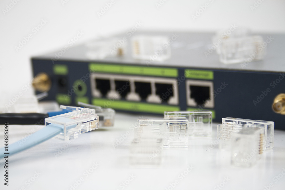 Selective focus, Network cable and router switch Selective focus, Network cable and router switch
