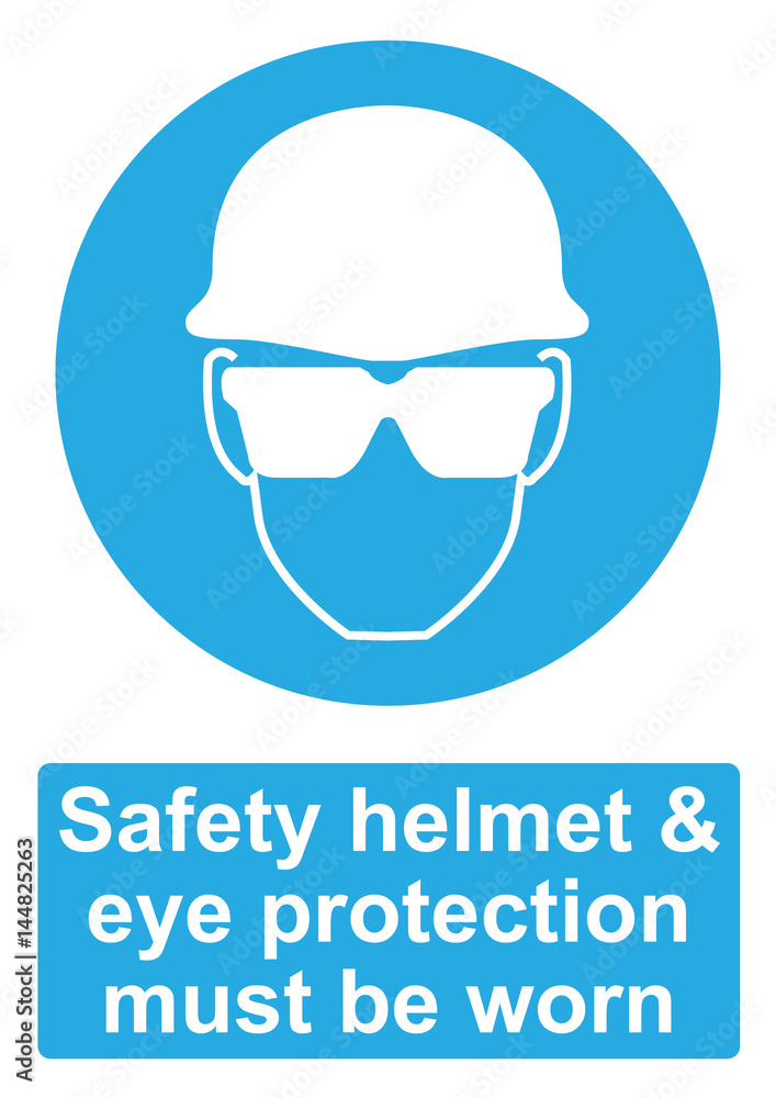 Blue Mandatory Sign isolated on a white background - Safety helmet and eye protection must be worn Blue Mandatory Sign isolated on a white background - Safety helmet and eye protection must be worn