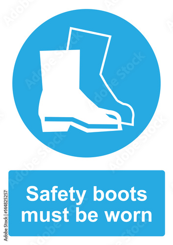 Blue Mandatory Sign isolated on a white background -  Safety boots must be worn photo