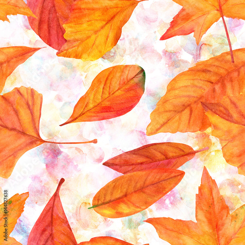 Seamless pattern with vibrant watercolor autumn leaves