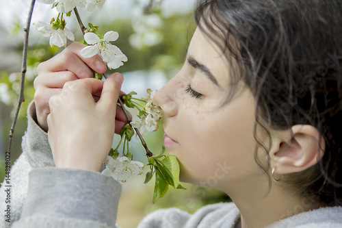 girl sitting on a tree