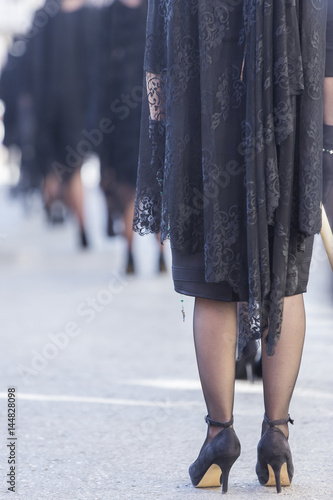 Woman dressed in mantilla during a procession of holy week, Spain