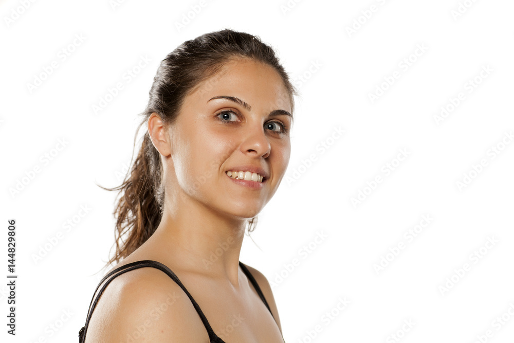 beautiful smiling woman with curly hair and blue eyes posing without makeup beautiful smiling woman with curly hair and blue eyes posing without makeup