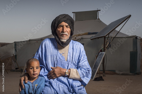 Adult man with grandson photo