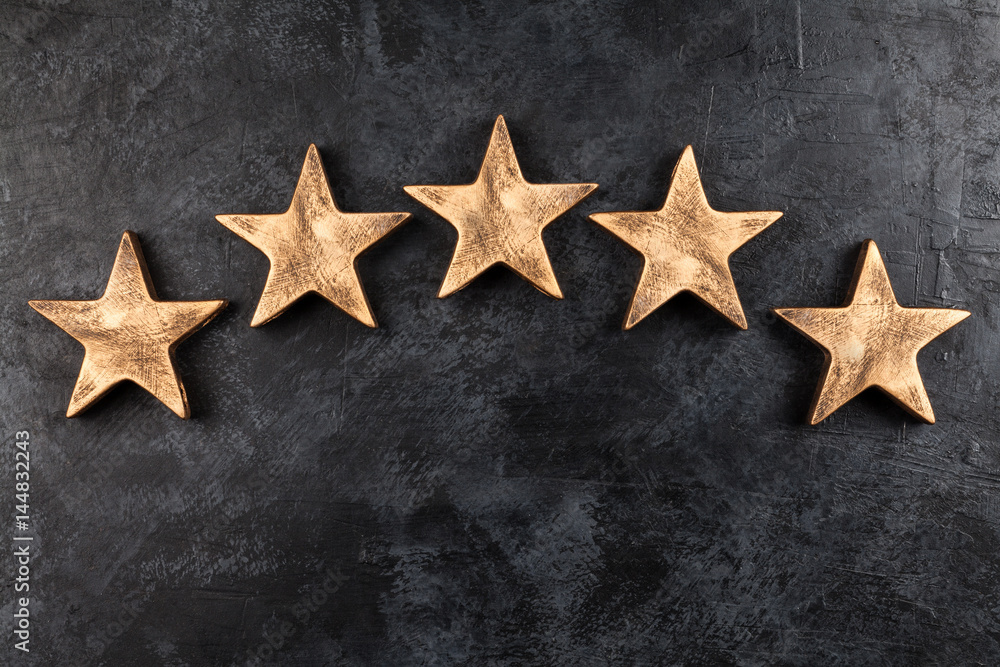 Obraz premium Five stars on dark background