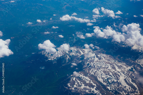 Snow-covered mountains of the plane in Montenegro