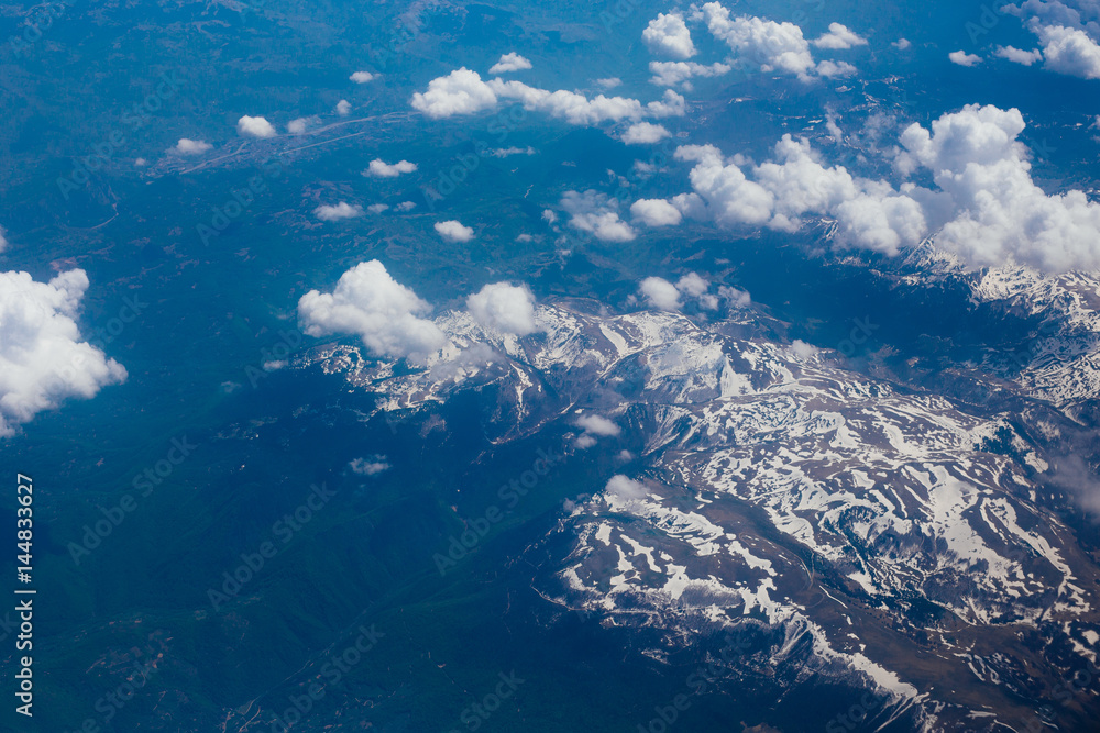 Snow-covered mountains of the plane in Montenegro