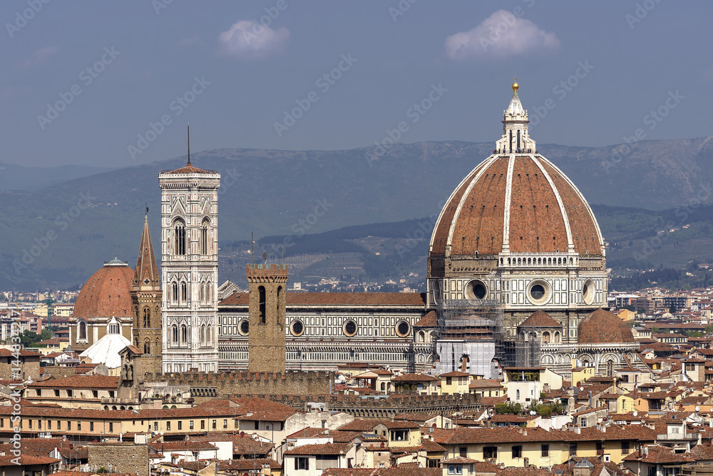 Beautiful aerial view of the Cathedral of Santa Maria del Fiore in the historic center of Florence, Italy, from Piazzale Michelangelo, on a sunny day