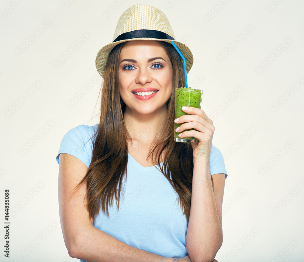 Portrait of young smiling woman holding smoothie glass. Portrait of young smiling woman holding smoothie glass.