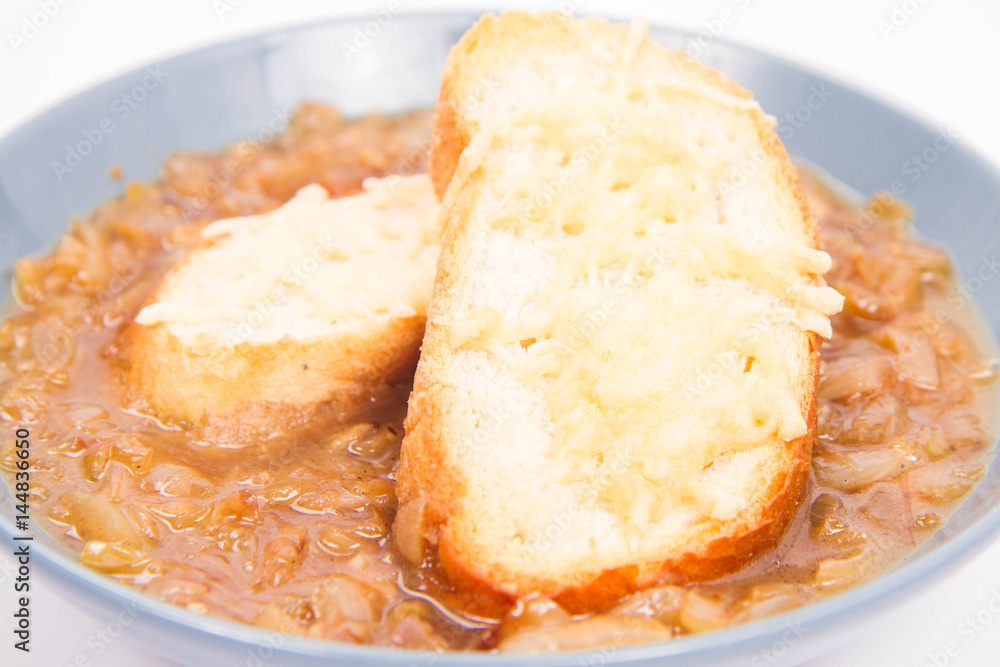 Onion soup with toast on a white background Onion soup with toast on a white background