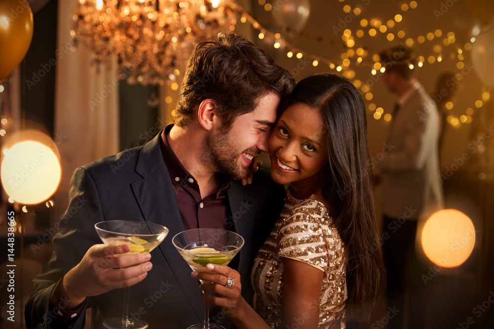 Romantic Couple Enjoying Cocktail Party Together Romantic Couple Enjoying Cocktail Party Together