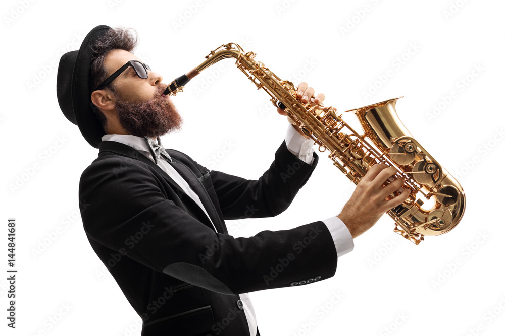Man in a suit playing on a saxophone - obrazy, fototapety, plakaty 
