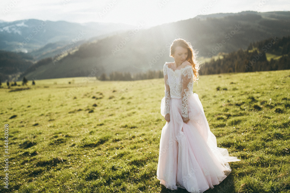Elegant bride at the mountains