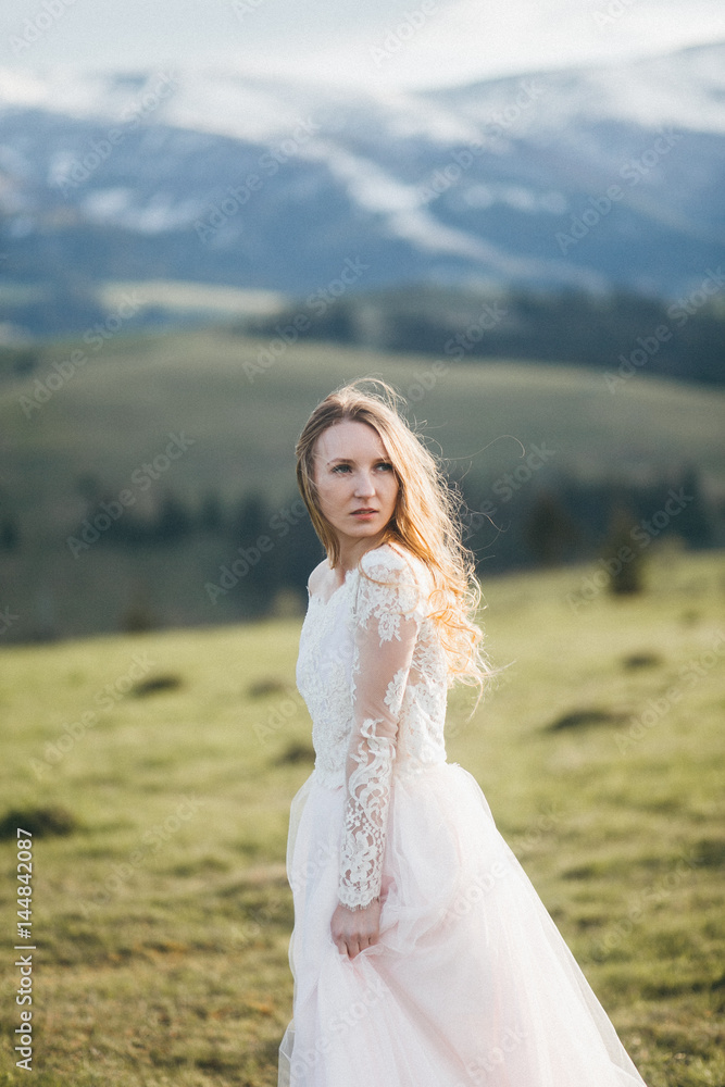 Elegant bride at the mountains