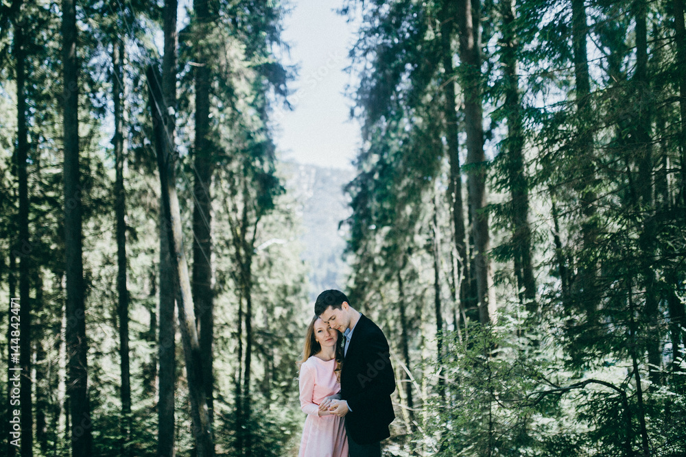 Happy couple in the forest Happy couple in the forest