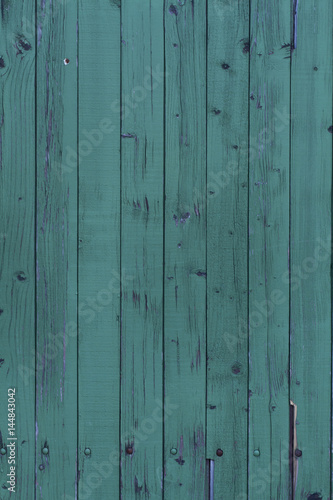 picture of old planks with green paint