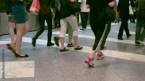 Passengers getting off from a subway train in Singapore 