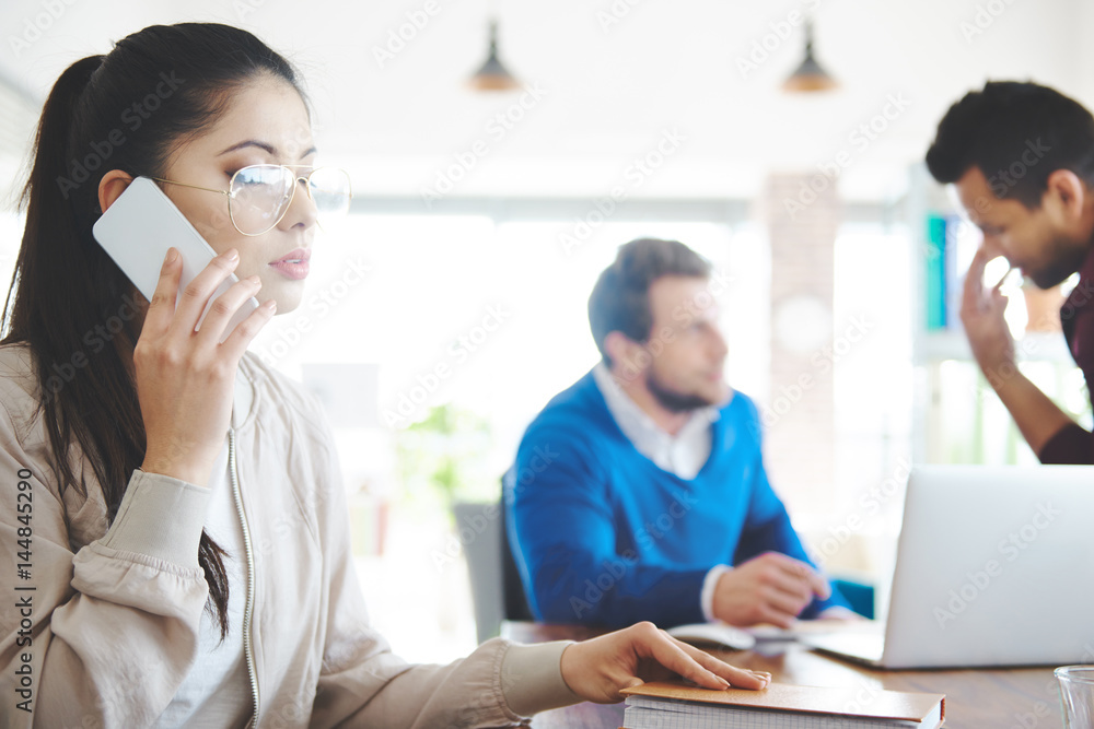 Female coworker contact with customers Female coworker contact with customers