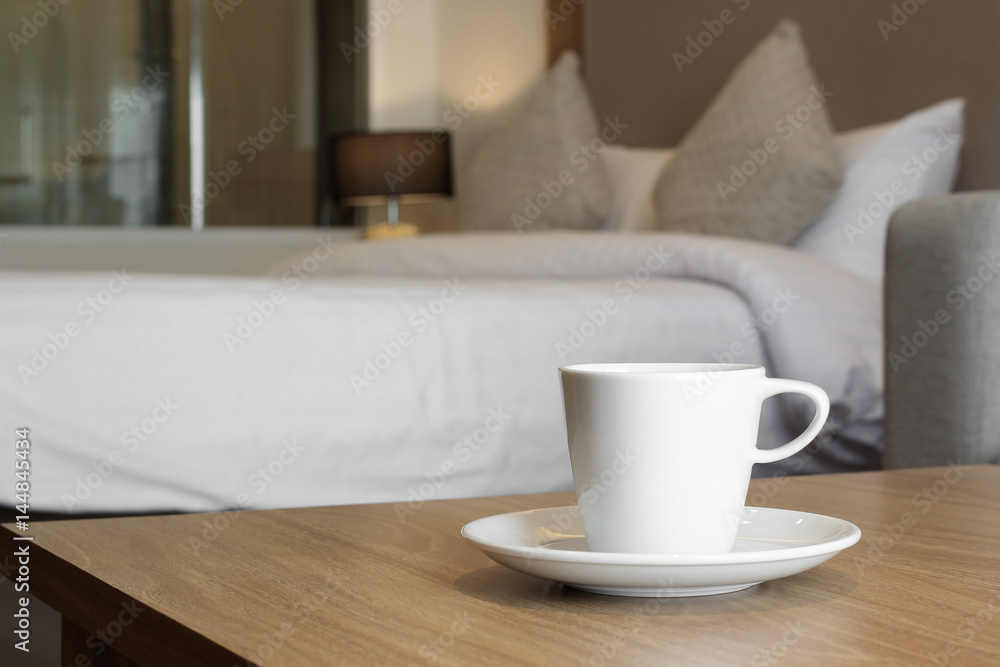 cup of coffee on wooden table cup of coffee on wooden table