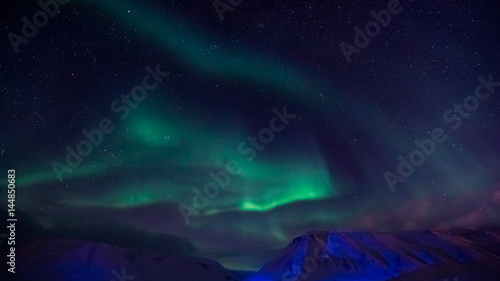 The polar Northern lights in the mountains of Svalbard, Longyearbyen, Spitsbergen, Norway wallpaper