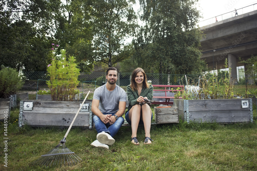 Portrait of couple in urban garden Portrait of couple in urban garden