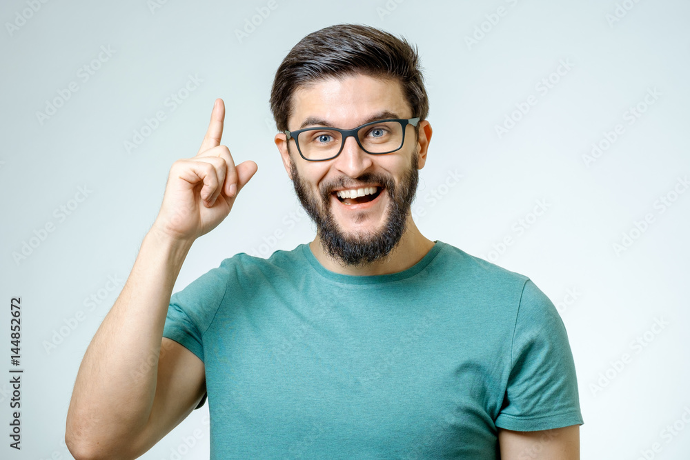 Excited man pointing a great idea Excited man pointing a great idea