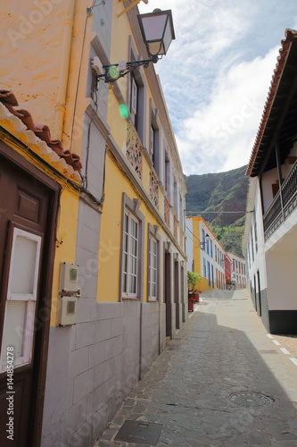 AGULO, LA GOMERA, SPAIN: Cobbled street with colorful houses inside the village of Agulo