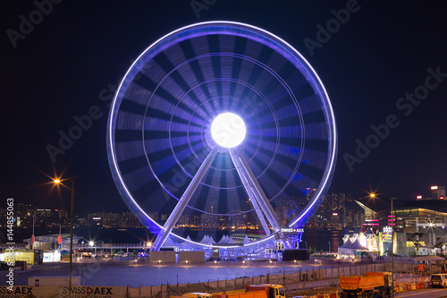 HONG KONG - AUGUST 04: big ferris wheel is located at Hong Kong side - long exposure August 04, 2015 at Hong Kong.