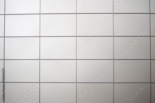 Wall panels of gray tile. Modern tile wall texture for exterior architecture.