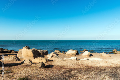 Coast with rocks and blue water
