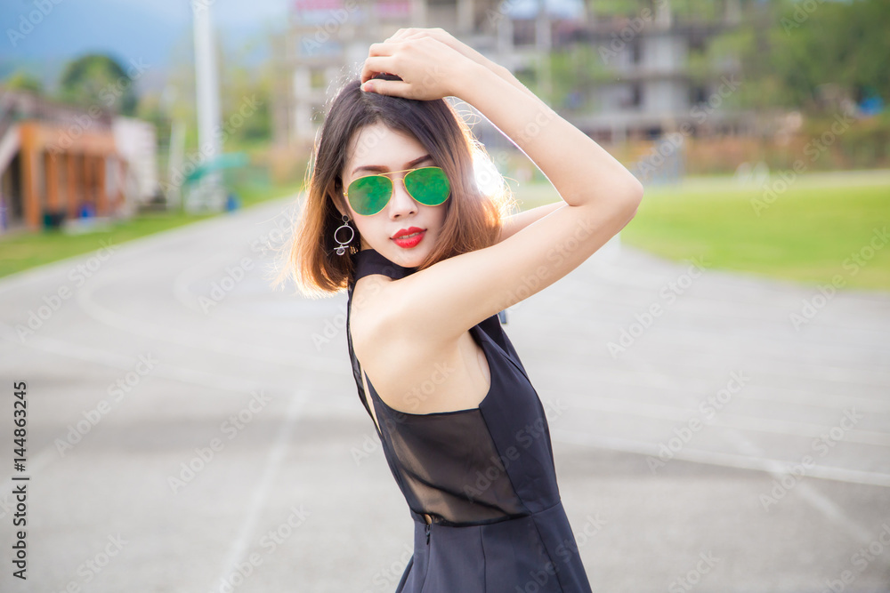 Attractive woman with short hair wearing sunglasses. Generative AI 30501973  Stock Photo at Vecteezy