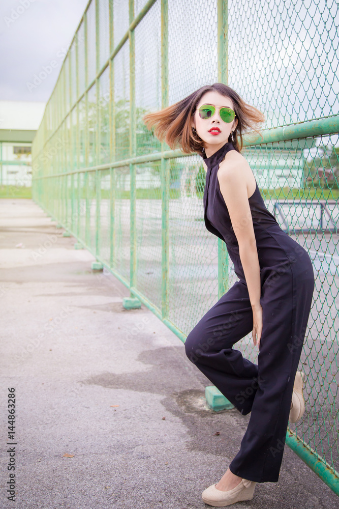 Full Length Portrait Brunette Girl Wearing Black Single Jeans Standing  Stock Photo by ©faestock 210482878