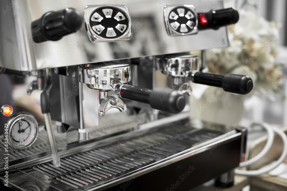 Fototapeta premium Close-Up of coffee machine making a cup of coffee in restaurant