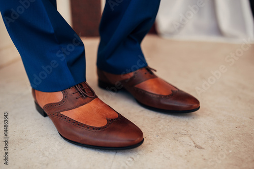 Men's black shoes on the floor. Wedding in Montenegro