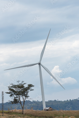 Wind Turbine for Electric on the blue sky photo