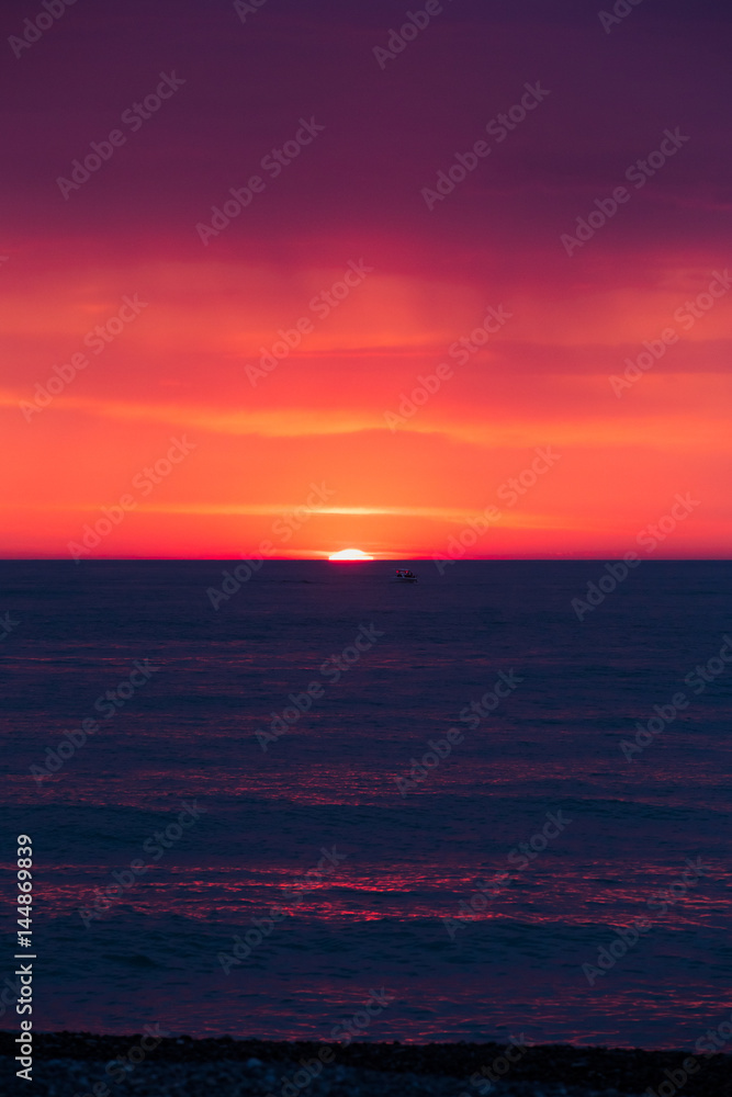 Natural Purple Color Sunset Or Sunrise Sky Over Sea After Storm 