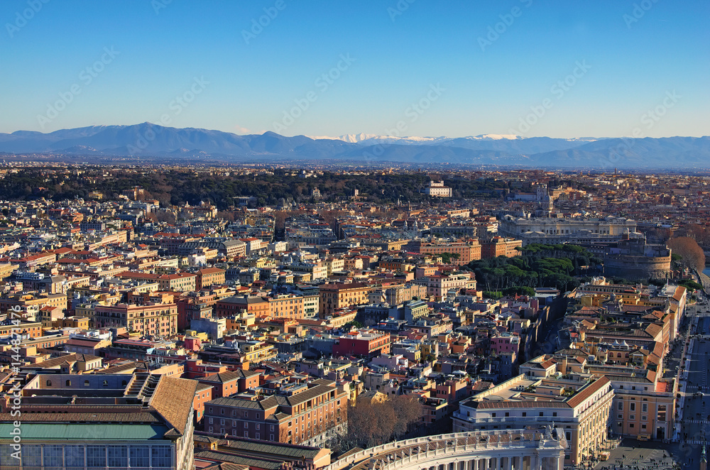 View to amazing cityscape of Rome from the top of dome Saint Peter's Basilica. Winter morning. Rome. Italy
