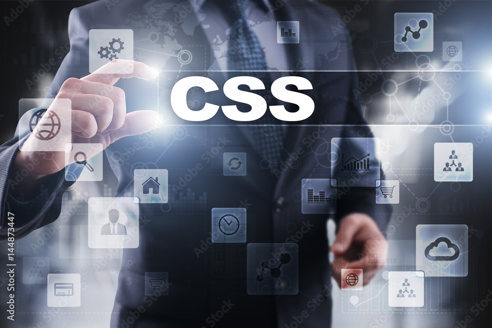 Businessman selecting css on virtual screen. Businessman selecting css on virtual screen.