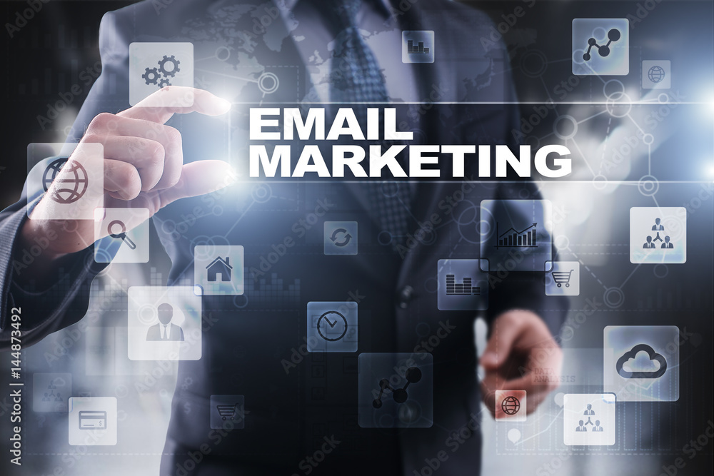 Businessman selecting email marketing on virtual screen. Businessman selecting email marketing on virtual screen.