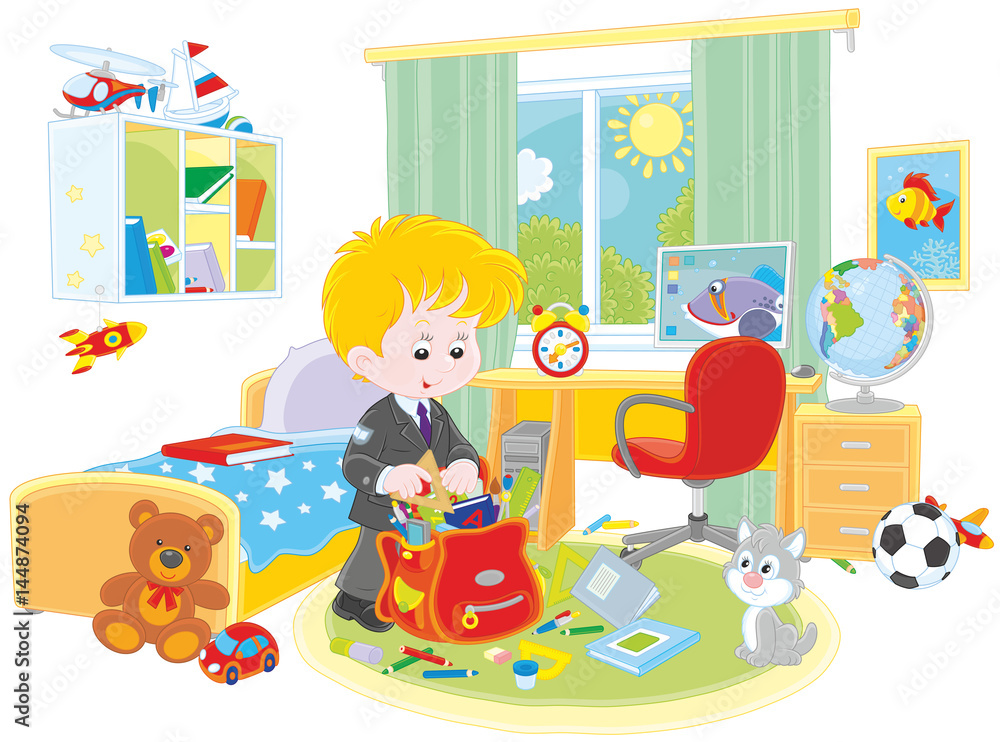 Schoolboy completing a schoolbag in his room Schoolboy completing a schoolbag in his room