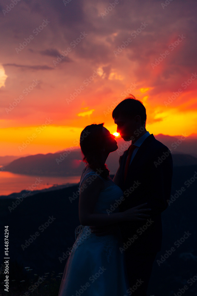 Silhouettes at sunset on Mount Lovcen in Montenegro