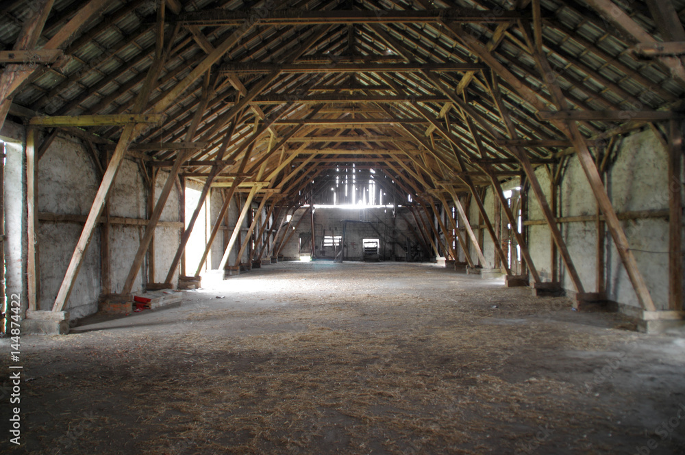 Wooden rural barn with big supports Wooden rural barn with big supports