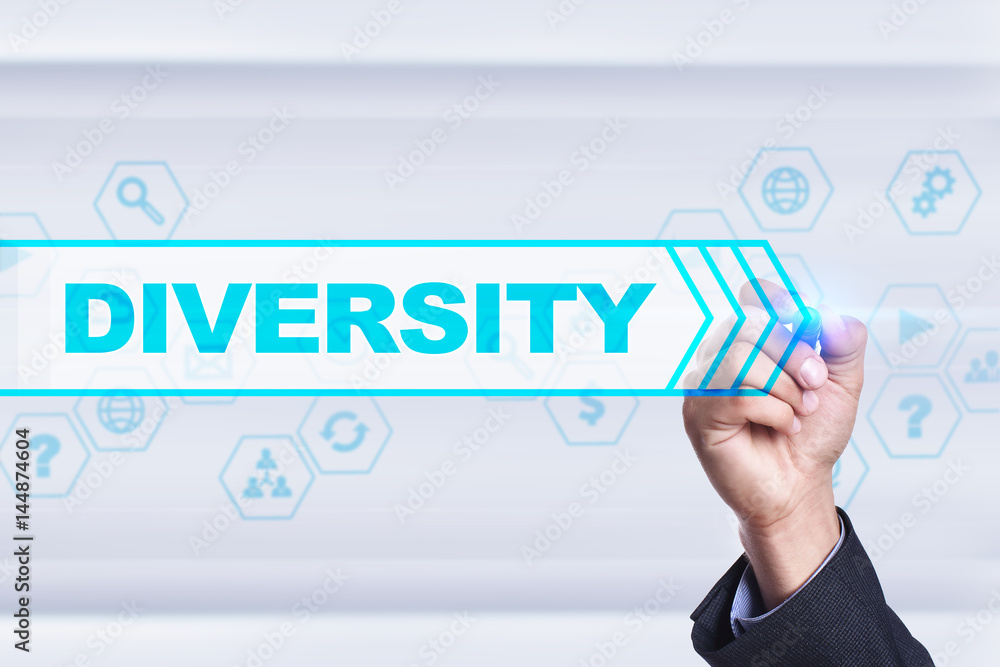 Fototapeta premium Businessman drawing on virtual screen. diversity concept.