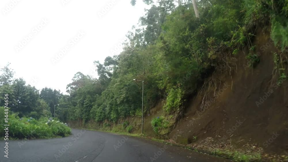 P.O.V. – Driving on a mistry road. Madeira, Island of Portugal P.O.V. – Driving on a mistry road. Madeira, Island of Portugal